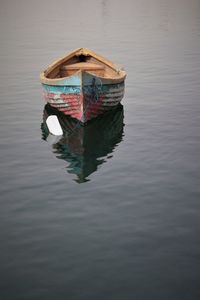 High angle view of boat floating on lake