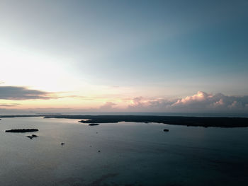 Scenic view of sea against sky during sunrise