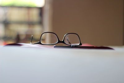 Close-up of sunglasses on table at home