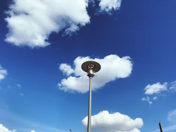 Low angle view of street light against sky