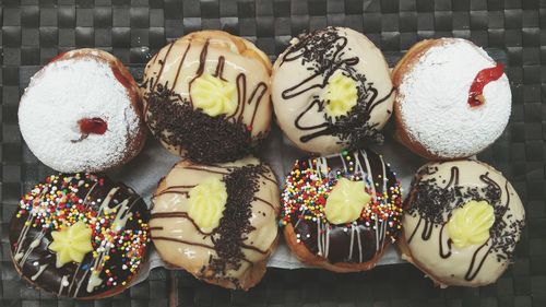 Directly above shot of cupcakes on table