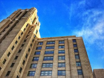 Low angle view of building against blue sky