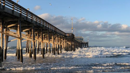 Scenic view of sea against sky during winter