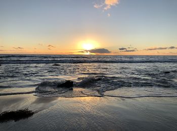 Scenic view of sea against sky during sunset