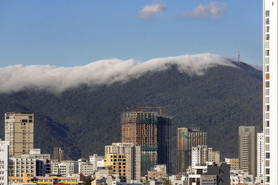 High angle view of buildings against sky