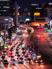 High angle view of traffic on city street at night