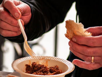 Midsection of person preparing food