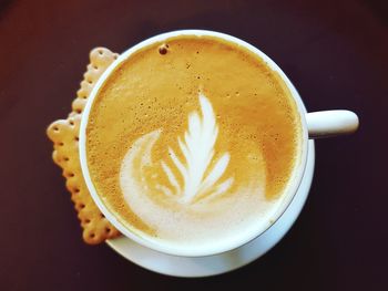 High angle view of cappuccino on table