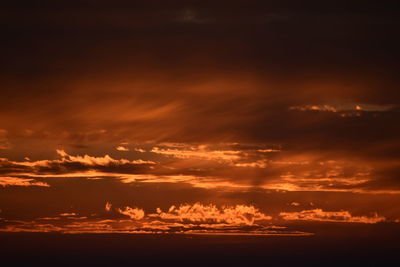 Scenic view of dramatic sky during sunset