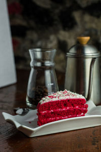 Close-up of cake served on table