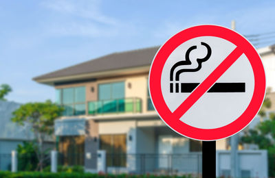 No smoking in public places sign on black iron pillar in nature, public places, fines, 