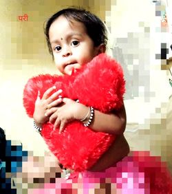 Portrait of cute girl at home