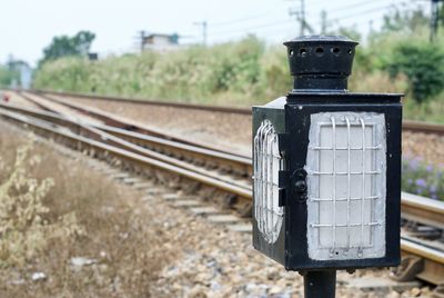 Close-up of signal at railroad track