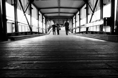 People walking in corridor