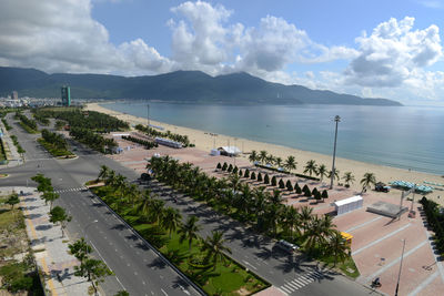 High angle view of road by sea against sky