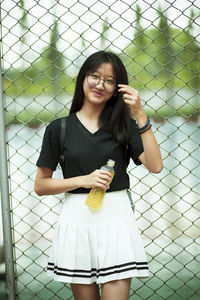 Portrait of girl standing outdoors