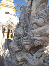 Sculpture of historic building against sky