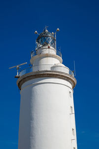 Low angle view of lighthouse against clear sky