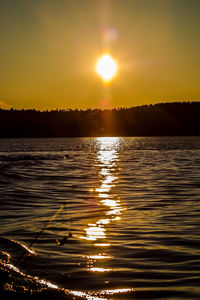Scenic view of sunset over river