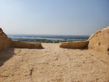Scenic view of beach against clear sky