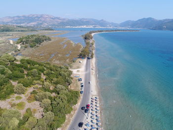 High angle view of road by sea against sky