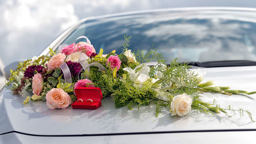 Close-up of rose bouquet on car