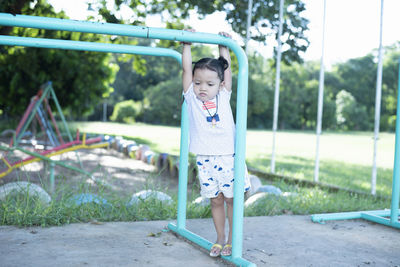 Portrait of cute girl playing in playground