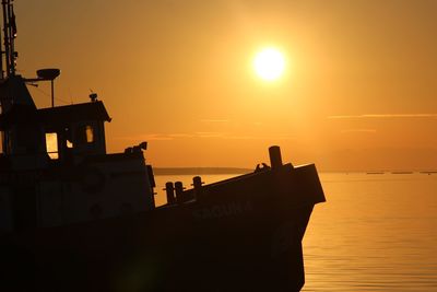 Scenic view of sea at sunset