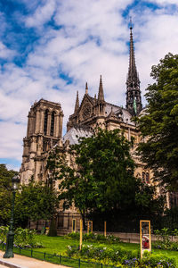 View of temple building against cloudy sky