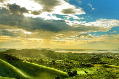 Scenic view of landscape against sky during sunset