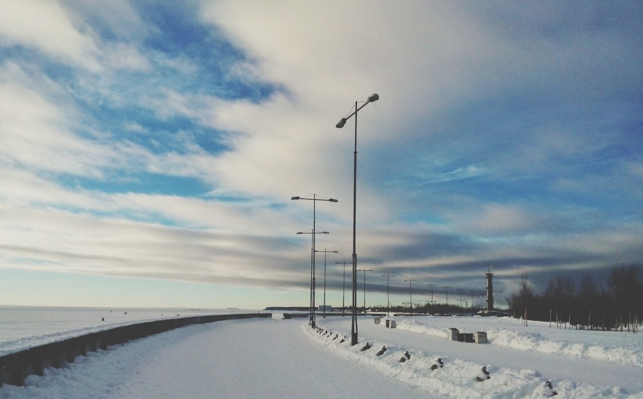 snow, winter, cold temperature, sky, the way forward, weather, transportation, season, cloud - sky, road, nature, cloudy, covering, tranquility, diminishing perspective, tranquil scene, beauty in nature, scenics, landscape, cloud