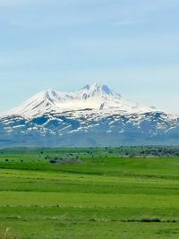 Scenic view of snowcapped mountains against sky