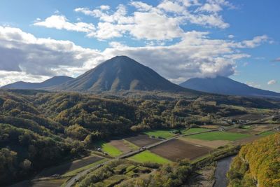 Scenic view of landscape against cloudy sky