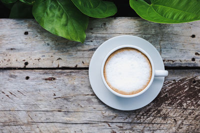 High angle view of cappuccino on table