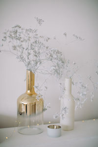 Close-up of glass vase on table