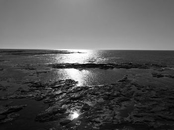 Scenic view of sea at sunset