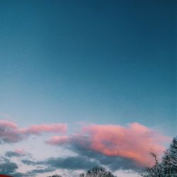 Low angle view of vapor trails in sky
