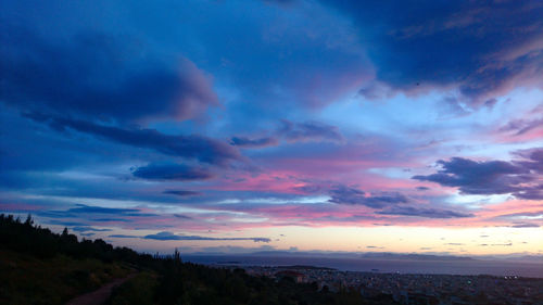 Scenic view of dramatic sky during sunset