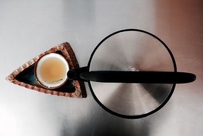 Close-up of coffee cup on table