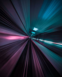 Blurred motion of illuminated tunnel