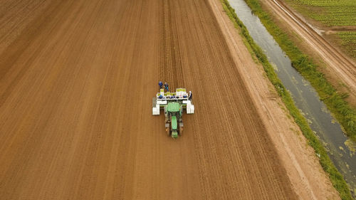High angle view of tractor on agricultural field