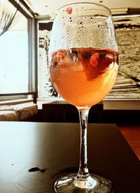 Close-up of beer glass on table