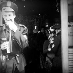 People playing guitar at music concert