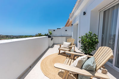 Built structures against clear blue sky