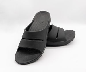 Close-up of shoes against white background