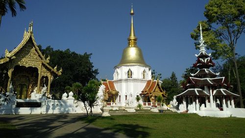 View of temple building against blue sky