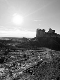 Castle on mountain against sky