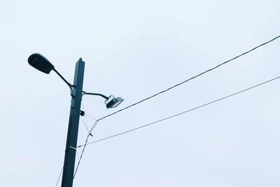 Low angle view of street light against clear sky