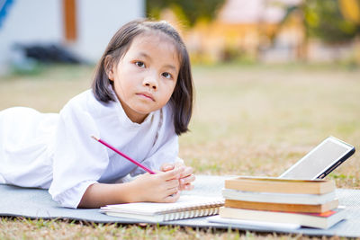 Portrait of a girl sitting on table