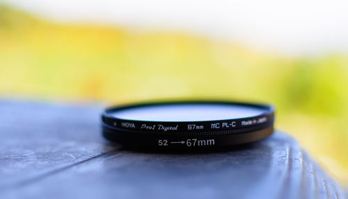 Close-up of camera on table